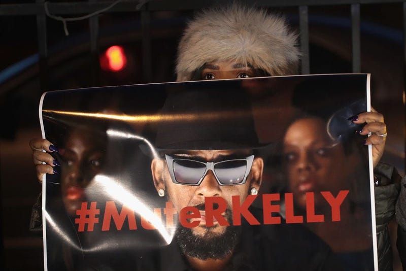 Demonstrators gather near the studio of singer R. Kelly to call for a boycott of his music after allegations of sexual abuse against young girls were raised on the highly-rated Lifetime mini-series "Surviving R. Kelly" on Jan. 9, 2019 in Chicago, Illi