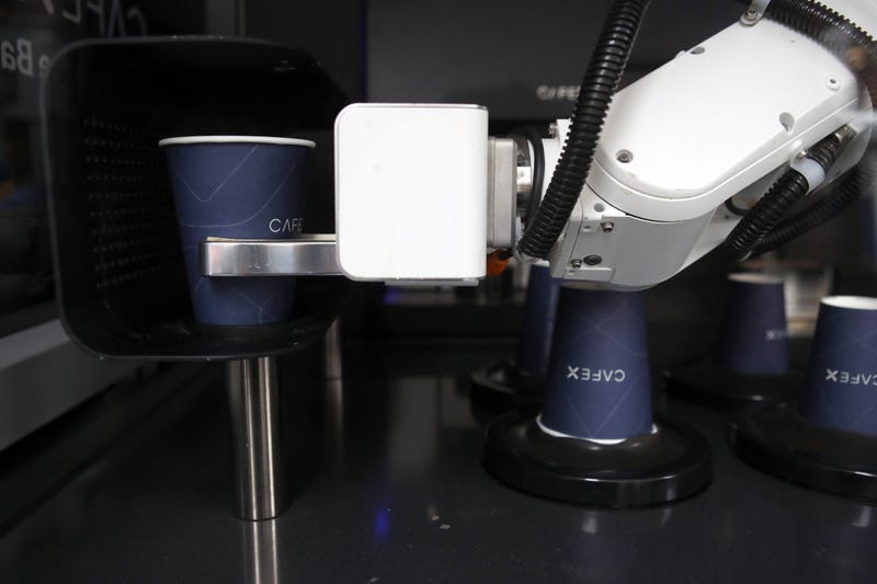A robotic barista at Cafe X makes coffee drinks on February 12, 2019 in San Francisco, California.
