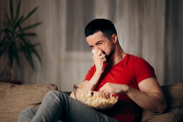 Man Crying While Watching a Movie