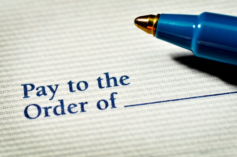 A check and a pen