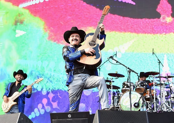 Mario Quintero Lara (C) and David Servin Raya (R) of Los Tucanes de Tijuana perform at Coachella Stage during the 2019 Coachella Valley Music And Arts Festival on April 19, 2019 in Indio, California.
