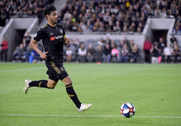 Carlos Vela #10 of Los Angeles FC chases down a ball during a 2-0 win over FC Cincinnati at Banc of California Stadium on April 13, 2019 in Los Angeles, California.