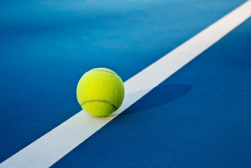 Tennis ball on court