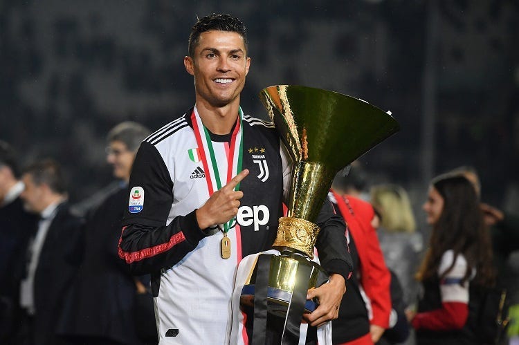 Cristiano Ronaldo of Juventus celebrates during the awards ceremony after winning the Serie A Championship during the Serie A match between Juventus and Atalanta BC on May 19, 2019 in Turin, Italy.