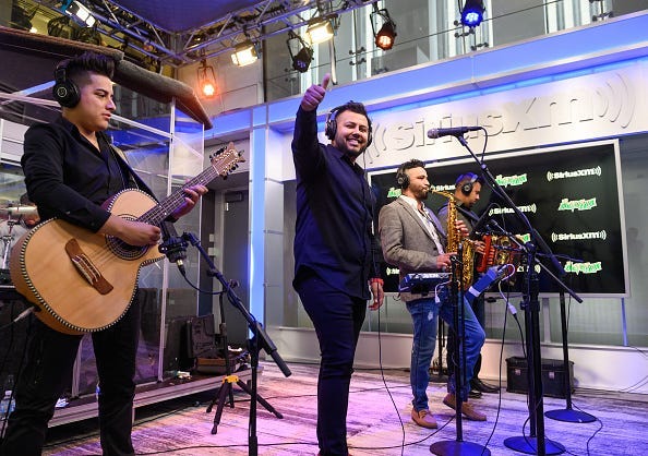 Adrian Gloria, Adrian Zamarripa, Israel Oviedo and Manuel Borrego of La Energia Nortena perform on SiriusXM's Aguila Channel at the SiriusXM Studios on May 23, 2019 in New York City.