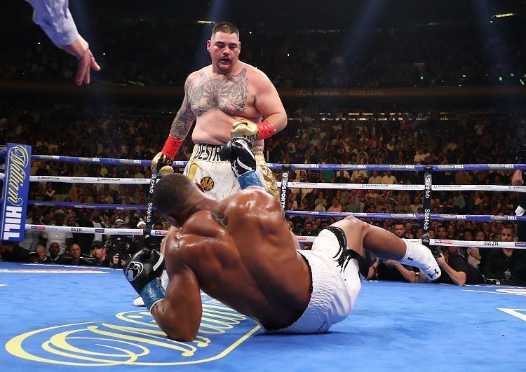 Andy Ruiz Jr knocks down Anthony Joshua in the third round during their IBF/WBA/WBO heavyweight title fight at Madison Square Garden on June 01, 2019 in New York City.
