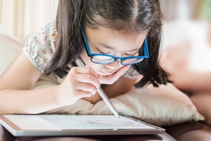 A student learning on a tablet