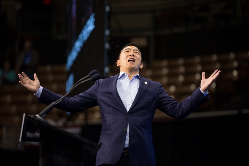 Democratic presidential candidate, entrepreneur Andrew Yang reacts as he goes on stage during the New Hampshire Democratic Party Convention