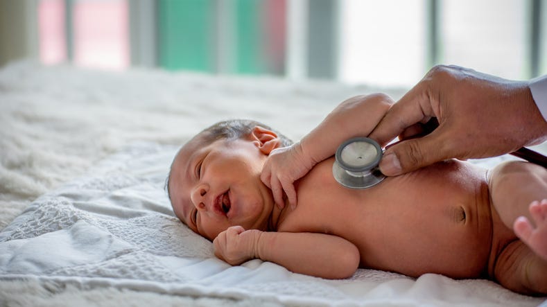 Baby with doctor