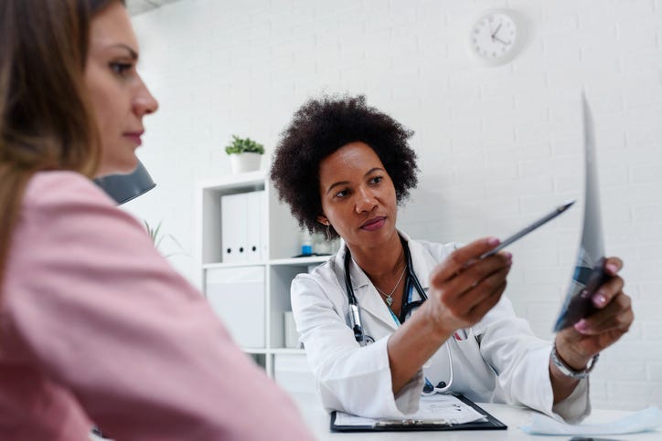 Woman talking with her doctor