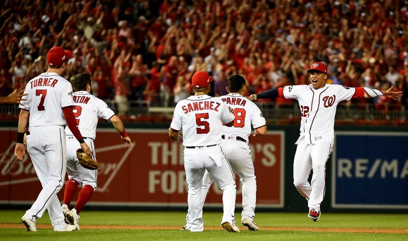PHOTOS: Stay in the fight! Nats beat Brewers in Wild Card