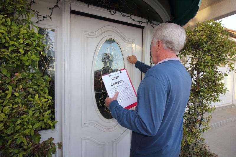 Census Worker Going Door to Door