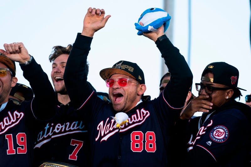 Gerardo Parra of the Washington Nationals cheers during a parade to celebrate the Washington Nationals World Series victory.
