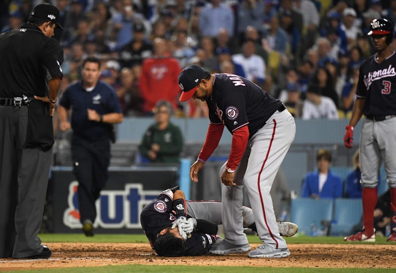 Nats’ Kurt Suzuki takes deflected pitch to face, leaves game