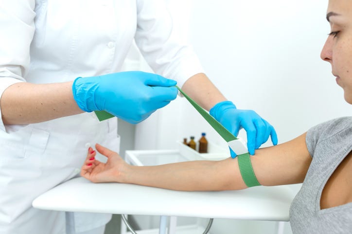 Woman getting blood drawn