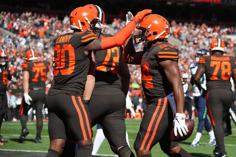 Nick Chubb #24 of the Cleveland Browns celebrates his first quarter touchdown with Jarvis Landry #80 while playing the Seattle Seahawks at FirstEnergy Stadium on October 13, 2019 in Cleveland, Ohio.