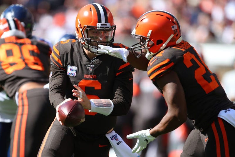 CLEVELAND, OHIO - OCTOBER 13: Baker Mayfield #6 of the Cleveland Browns hands off to Nick Chubb #24 for a second quarter run while playing the Seattle Seahawks at FirstEnergy Stadium on October 13, 2019 in Cleveland, Ohio. (Photo by Gregory Shamus/Getty I