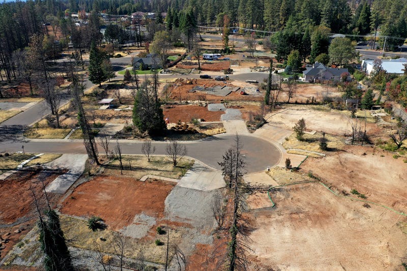 n aerial view of a neighborhood destroyed by the Camp Fire October 21, 2019 in Paradise.