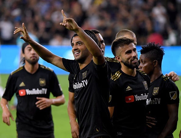 Carlos Vela #10 of Los Angeles FC celebrates his second goal of the game, to take a 2-0 lead over the Los Angeles Galaxy, during the first half of the Western Conference Semifinals at Banc of California Stadium on October 24, 2019 in Los Angeles, Californ