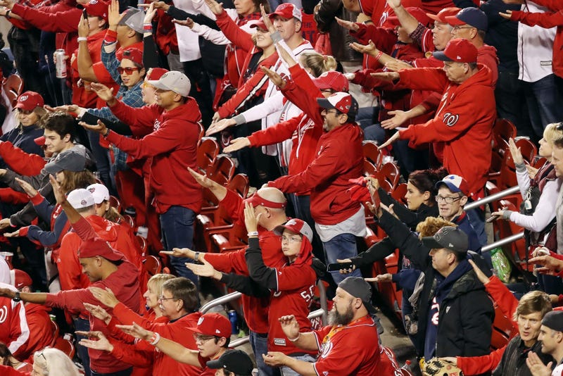 Fans take part in the Baby Shark song as Gerardo Parra (not pictured) of the Washington Nationals comes up at bat against the Houston Astros during the sixth inning in Game 3.
