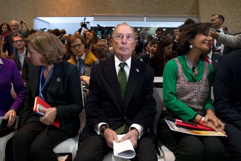 Democratic presidential candidate for US and former New York City Mayor Michael Bloomberg (C) attends an event at the COP25 Climate Conference on December 10, 2019 in Madrid, Spain.