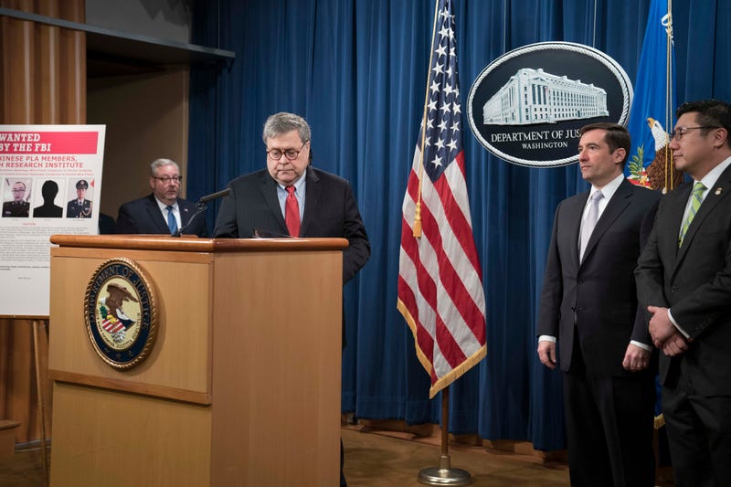 Attorney General William Barr arrives to a press conference at the Department of Justice along with DOJ officials on February 10, 2020 in Washington, DC.
