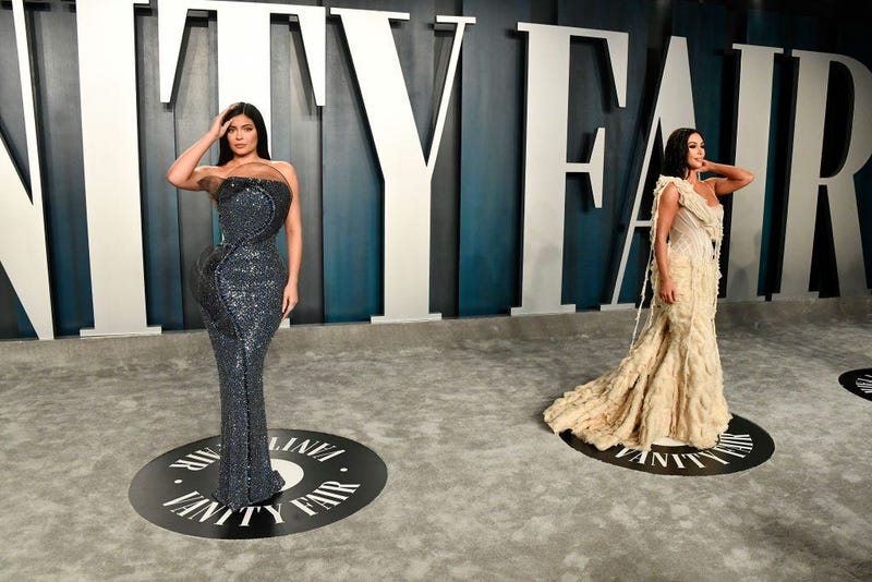 Kylie Jenner and Kim Kardashian (R) attend the 2020 Vanity Fair Oscar Party hosted by Radhika Jones in Beverly Hills, CA.