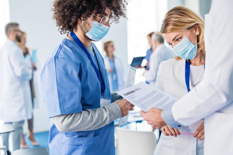 Doctors in hospital discussing coronavirus