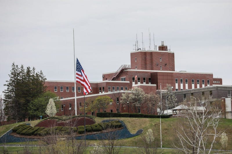 An American flag flies at half-mast outside the Holyoke Soldiers' Home on April 29, 2020 in Holyoke, Massachusetts. In one of the deadliest known COVID-19 outbreaks at a long-term care center in the U.S.
