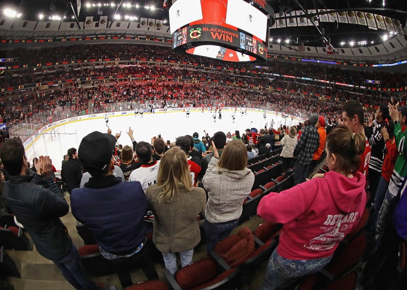 Fans cheer after the Chicago Blackhawks beat the San Jose Sharks at the United Center on March 11, 2020 in Chicago, Illinois.