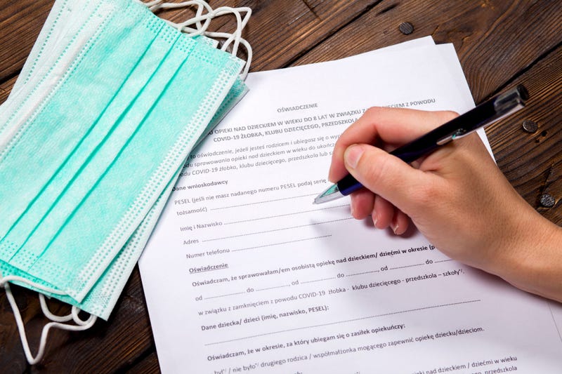 Worker filling out unemployment forms
