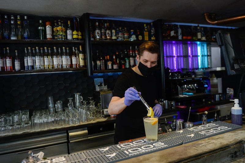 Bartender wearing mask