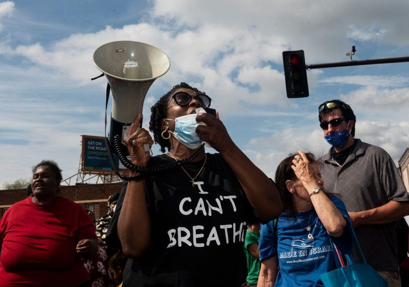 Protesters call for justice for George Floyd following his death on Monday outside the Cup Foods on May 26, 2020 in Minneapolis, Minnesota.