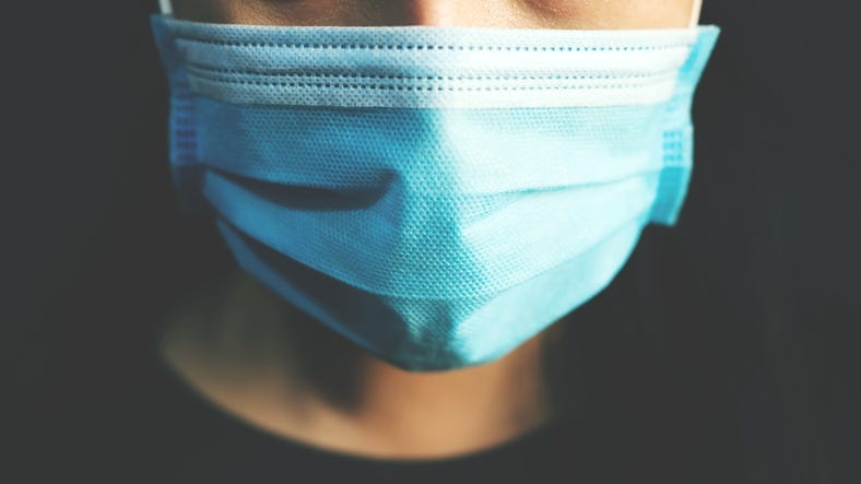 A person wearing a mask