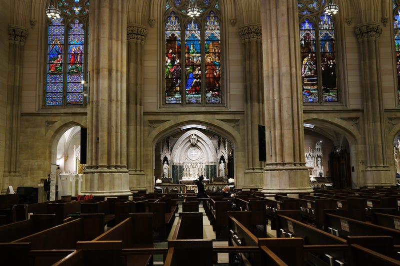 Church pews stand empty as Cardinal Timothy Dolan, the Archbishop of New York, celebrates Easter Sunday Mass in a nearly empty St. Patrick’s Cathedral as the coronavirus outbreak has kept most churches empty this Easter on April 12, 2020 in New York City.