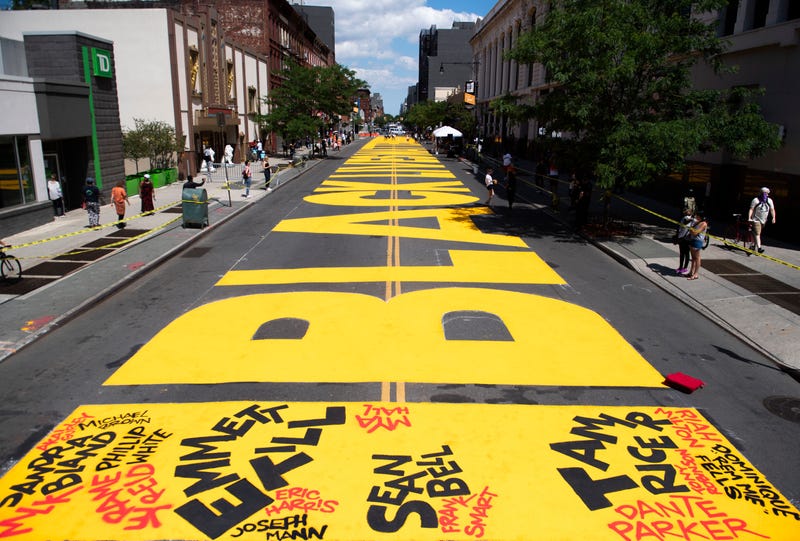 A Black Lives Matters mural covers Fulton St on June 14, 2020 in the Brooklyn borough of New York City.