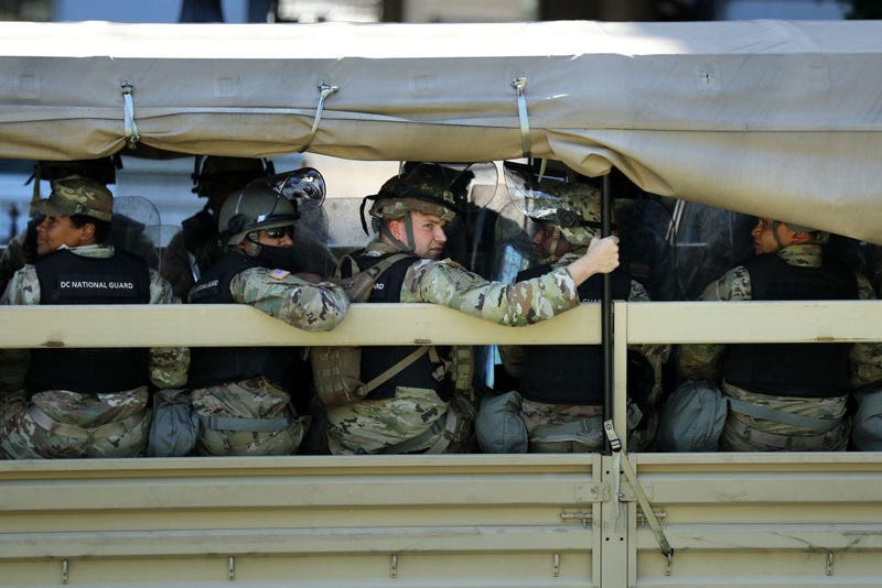 Trucks transport District of Columbia National Guard troops along West Executive Drive in support of law enforcement officers that are keeping demonstrators away from the White House June 01, 2020 in Washington, DC.