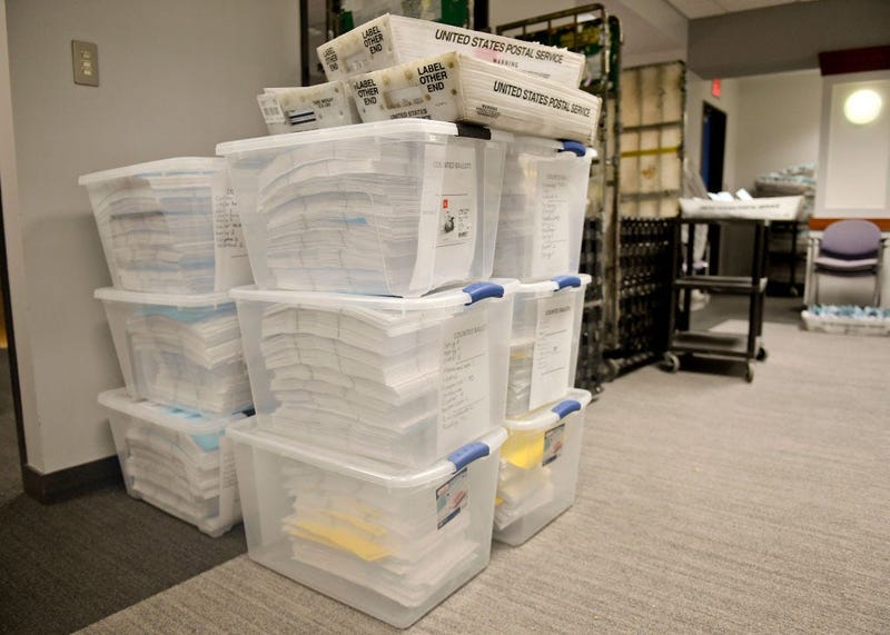 Mail-in ballots await counting