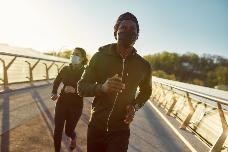 Runners in masks