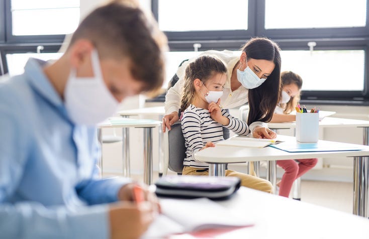 Kids in school with masks