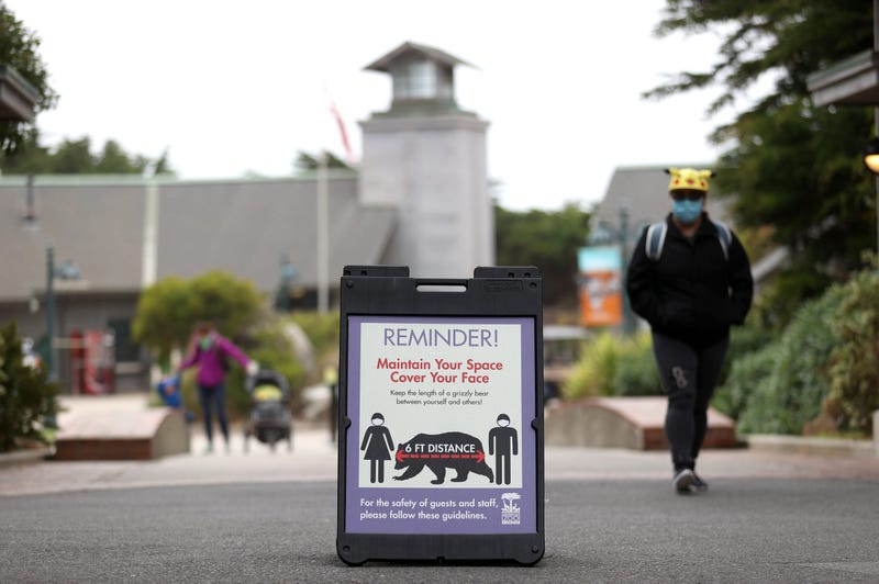 A sign encouraging social distancing are displayed at the San Francisco Zoo & Gardens on July 13, 2020 in San Francisco, California.