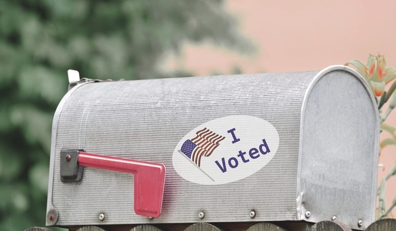Mail box with voting sticker