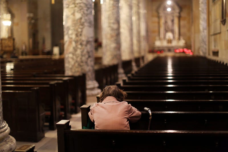 A woman prays in a Catholic church on May 20, 2013 in Waterbury, Connecticut.