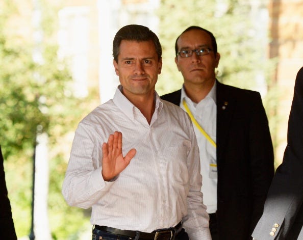 exico's President Enrique Peña Nieto (L) arrives to the Allen & Co. annual conference on July 10, 2013 in Sun Valley, Idaho. The resort will host corporate leaders for the 31st annual Allen & Co. media and technology conference where some of the wealthies