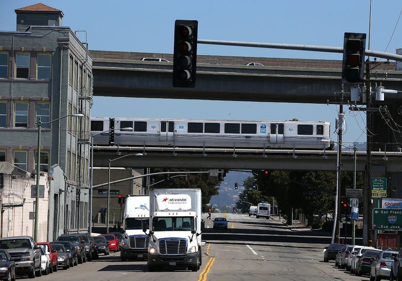 : A Bay Area Rapid Transit (BART) train travels towards downtown Oakland on August 2, 2013 in Oakland, California.