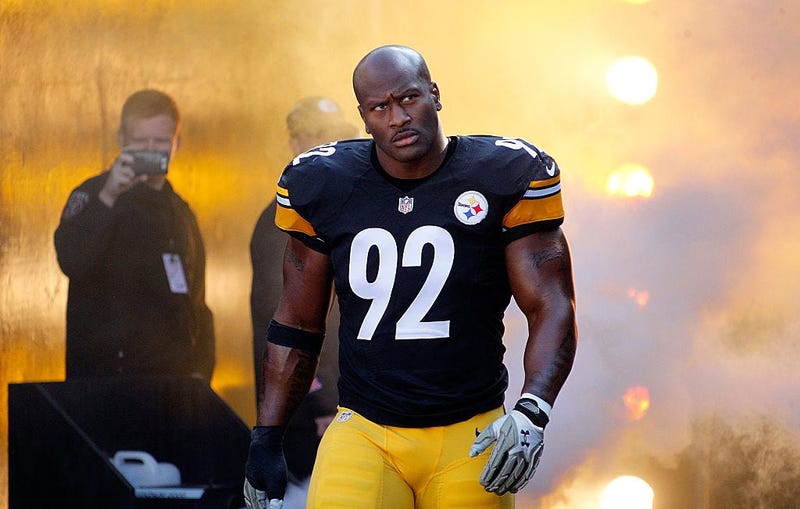 James Harrison #92 of the Pittsburgh Steelers walks onto the field before the start of a game