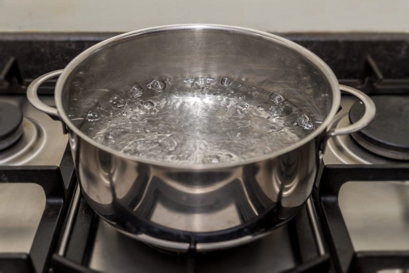 Boiling water on stove