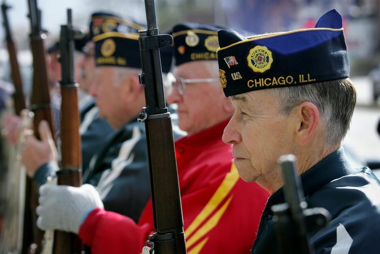 Members of the American Legion Post 220 prepare for a rifle salute during a Veterans Days ceremony November 11, 2004 in Chicago, Illinois. About 30 people gathered for the small ceremony on the eastern edge of the city.