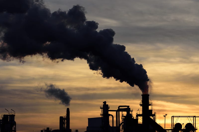 A cloud of pollution released by an industry