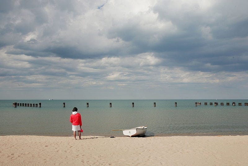Lifeguard Ben Ingvoldscad watches over the waters of Lake Michigan at North Avenue Beach May 27, 2005 in Chicago, Illinois.